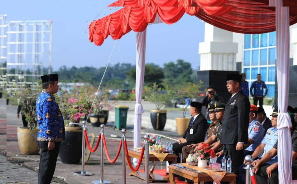Kepala Dispora Pekanbaru Hadiri  Upacara Hari Otonomi Daerah ke-28 di Tenayan Raya